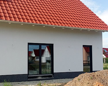 RMC Referenzen – Einfamilienhaus Aussenputz RMC Referenzen - Einfamilienhaus Aussenputz